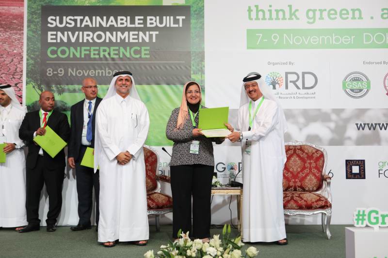 Eman Farag receiving sustainability award